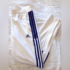 White And Black Adidas Trio Pant, Size Small No Marks, Stains, Snags, Or Tears Fitted White Bottoms With Side Stripes, White Stretch Bottoms With Three Stripes, White Athleisure Bottoms With Side Stripes, Sporty White Pants With Three Stripes, White Athleisure Bottoms With Contrast Stripes, Fitted White Adidas Bottoms, Casual White Pants With Contrast Stripes, Adidas White Fitted Bottoms, White Adidas Athleisure Pants