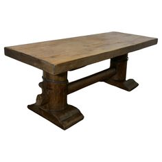 an old wooden table is shown against a white background