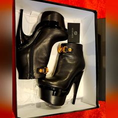 Stunning Authentic Versace Black Leather Booties!! Gold Plated Medusa, Great Condition, As Seen In Many Celebrities, Dust Bag Included And Box. 7 Inch Heel. Hard To Find, Iconic Versace Platforms!! Luxury Boots With 4-inch Heel For Night Out, Luxury Leather Lined Boots For Night Out, Luxury Heeled Boots With 4-inch Heel For Party, Luxury Calf Leather Heeled Boots For Night Out, Party High Heel Boots With Leather Lining, Party High Heeled Boots With Leather Lining, Luxury Black Heeled Boots With Deep Heel Cup, Luxury Heeled Boots With Sculpted Heel For Night Out, Black Heeled Boots With Leather Lining For Party