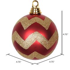 a red and gold christmas ornament hanging from a string