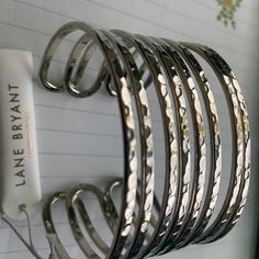 Lb Silver Cuff Bracelet. Trendy Stackable Metal Cuff Bracelet, Trendy Metal Stackable Cuff Bracelet, Modern Silver Cuff Bracelet For Spring, Trendy Stackable Silver Cuff Bracelet, Silver Bangle Cuff Bracelet For Spring, Nickel-free Trendy Cuff Bracelet, Trendy Nickel-free Metal Cuff Bracelet, Silver Cuff Bracelet, Silver Cuff