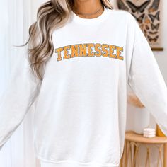 "Stay cozy and stylish all year round with this Tennessee sweatshirt. Made from high-quality materials, this sweatshirt features the iconic Tennessee state design, showcasing your love for the Volunteer State. Whether you're cheering on your favorite sports team or representing your hometown, this sweatshirt is perfect for any proud Tennessee resident. Its relaxed fit and soft fabric make it perfect for lounging at home or adding a layer of warmth when you're out and about. Show your Tennessee pride with this must-have sweatshirt. SIZE UP 1-2 SIZES FOR AN OVERSIZED LOOK! Thanks so much for shopping with me! Please message me with any questions you may have! I am always available to help!  📝Please note that, due to variations amongst computer monitors, actual colors may vary slightly from Tennessee Sweatshirt, Taylor Boyfriend, Orange Sweatshirt, State Design, Varsity Sweatshirt, Slay Girl, Distressed Sweatshirt, Tennessee State, Comfort Colors Sweatshirt