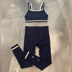 The Upside Bra- Xs Leggings- L Sold As Set Fitted Blue Sports Sets, Blue High Stretch Athleisure Sets, Fitted Navy Elastane Activewear, Blue Seamless Sports Bra With Flexible Fit, Blue Stretch Athleisure Set, Blue Sportswear Sets For Training, Sporty Blue Training Sets, Functional Blue Leggings With Seamless Construction, Blue High Stretch Workout Sets