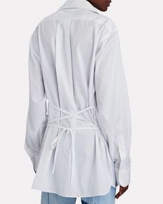 Luel Studio Thea Lace-Up Back Shirt In White | INTERMIX® Luxury Oversized Shirt With Lapel Collar, Luxury Oversized Shirt With Shirttail Hem, Luxury Oversized Shirt With Buttons, Luxury Garment Washed Button-up Shirt, Luxury Relaxed Fit Shirt With Button Closure, Rochester Couture Shirt, Back Shirt, Oversized Silhouette, Retail Therapy