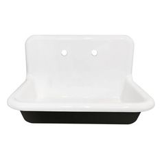 a white sink sitting on top of a black counter