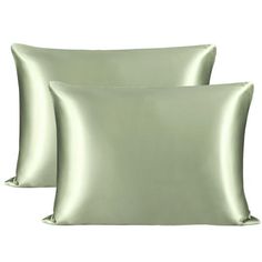 two satin pillows on white background