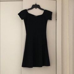 Off The Shoulder Black Stretch Skater Dress - Never Worn! Black Stretch Mini Dress With Short Sleeves, Chic Black Scoop Neck Dress, Black Fitted Scoop Neck Dress, Fitted Black Dress With Scoop Neck, Black Fitted Dress With Scoop Neck, Black Stretch Mini Dress Casual, Black Scoop Neck Spring Dresses, Black Scoop Neck Dresses For Spring, Black Scoop Neck Dress For Spring