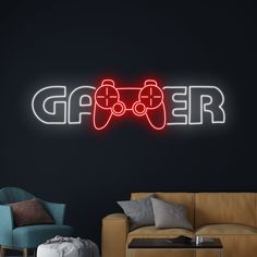 a living room with a couch, chair and neon gaming controller sign on the wall