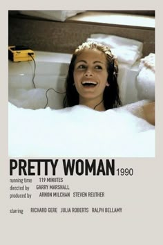 a woman in a bathtub with headphones on and the words pretty woman 1900