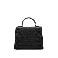 DESIGN
The stunning Kim shoulder bag is perfect for adding a dash of chic to any ensemble. Made in Italy from croco embossed calf skin, this versatile piece has an intriguing look, that will complete any style in a memorable way. This style can be used as a handbags or a shoulder bag, taking you from day to evening with ease.
DESCRIPTION
Made In ItalyCroco embossed leather with matching trimMicrofiber interiorGold-toned detailing
DETAILS
6.7"h x 3"w x 9"l3" handle drop35" to 47" detachable/adjus Timeless Crocodile Pattern Bags, High-end Top Handle Bag With Crocodile Pattern, Designer Crocodile Pattern Top Handle Shoulder Bag, High-end Office Bags With Crocodile Pattern, Modern Formal Shoulder Bag With Crocodile Pattern, Elegant Office Shoulder Bag With Crocodile Pattern, Elegant Shoulder Bag With Top Handle And Crocodile Pattern, Elegant Crocodile Pattern Shoulder Bag For Office, Formal Crossbody Shoulder Bag With Crocodile Pattern