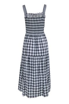 We're gaga for gingham here at Current Boutique, and this breezy beauty from The Great is no exception! Made in a light and airy maxi silhouette with a posh gingham print and chic smocked bodice, this flowy frock is perfect for those sweet summer months. Go totally fab for the farmers' market, brunch and beyond when you pair this darling dress with strappy sandals and a cute straw bag. Size L 100% Cotton Pullover Lined skirt Straight, scalloped neckline Sleeveless All-over gingham print Smocked Gingham Dress Outfit, Smocked Maxi Dress, Skirt Straight, Scalloped Neckline, Darling Dress, Sweet Summer, Summer Dress Outfits, Lined Skirt, Cotton Pullover