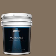 the behr marquee paint is shown in brown