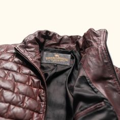 Embrace the spirit of adventure with the Teton Leather Down Filled Light Jacket, a tribute to the rugged majesty of Wyoming’s Teton Mountain Range. Its rich, full-grain leather evokes the grandeur of these storied peaks, making a statement that is both daring and refined—striking the perfect balance between boldness and restraint. Crafted from premium full-grain sheep leather that develops a handsome patina with wear, the jacket features a modern brick-stitch pattern for a contemporary update. T Waxed Canvas Jacket, Dark Brown Leather Jacket, Light Down Jacket, Leather Puffer, Mahogany Brown, Light Down, Leather Camera Bag, Lambskin Leather Jacket, Leather Jacket Style