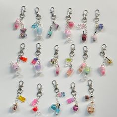 a bunch of charms that are sitting on a table