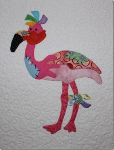 a pink flamingo with a colorful hat on its head is standing in front of a white wall