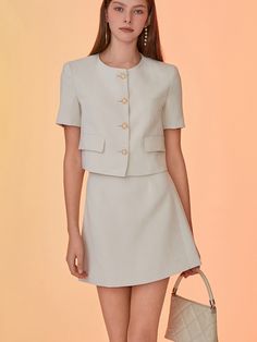 This product, the Venla Linen Mini Skirt, encapsulates timeless elegance in a contemporary design. With its high-waisted fit and straight silhouette, the skirt ensures a flattering shape for various figures. The simplicity of the design is punctuated by subtle detailing, making it a versatile piece for both casual and formal occasions. - The Venla Linen Mini Skirt offers a high-waisted design that elongates the figure and pairs seamlessly with cropped or tucked-in tops.- A clean, straight cut provides a timeless silhouette, while the skirt's minimalistic appeal is enhanced by fine stitching and discrete fastenings.- Constructed with quality linen, this skirt promises both durability and breathability for all-day comfort.- The inclusion of side pockets combines functionality with a cas Elegant Solid Mini Skirt With Pockets, Elegant Beige Mini Skirt For Office, Elegant Formal Mini Skirt With Pockets, Elegant Tailored Skirt Suit For Summer, Elegant Fitted Mini Skirt With Pockets, Linen Mini Skirt, Sewing Ideas, Straight Cut, Formal Occasion