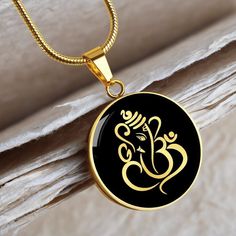 "This Ganesha Necklace Is the Perfect Gift, Whether for Yourself or a Loved One.  Explore all our Witchcraft jewelry here: https://www.etsy.com/in-en/shop/SymbolicPresent?ref=seller-platform-mcnav&section_id=22613465 ➜ Our jewelry is made of high-quality surgical steel with a shatterproof liquid glass coating and an 18k gold finish option. ➜ Engrave onto the back of the Ganesha pendant your loved one's name, your wedding date, an anniversary, or anything else you want to remember and keep you cl Spiritual Round Necklaces For Festive Occasions, Festive Spiritual Round Necklace, Diwali Gift Temple Jewelry Necklace, Spiritual Round Necklaces For Festivals, Engraved Temple Jewelry As A Gift, Temple Jewelry Round Pendant Gift, Symbolic Festive Jewelry For Festivals, Gift Temple Jewelry Necklace, Gift Round Temple Jewelry Necklace