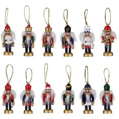 twelve nutcracker ornaments in different colors and sizes