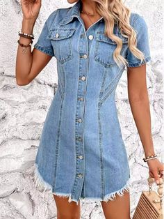 Denim Short Sleeve Button Front Minimalist Blue Jean Distressed Mini Shirt Dress This retro denim dress is a classic summer choice for any woman who wants to make a statement in a minimalist way.Vintage style with a modern contemporary twist making this a playful choice.Collar neckline and full button front closure lends to simplicity while the round torn raw hem mini length gives a edgy touch.Functional chest pockets gives a girl-next-door 80s vibe.Vertical and asymmetrical seams with a light s Short Sleeve Denim Dress, Plus Size Activewear, Mini Shirt Dress, Charming Charlie, Formal Evening Dresses, Chic Boutique, Short Tops, Denim Dress, Casual Chic