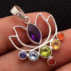 "Amazing 7 Gemstone Lotus Chakra Pendant Christmas Sale - 925 Sterling Silver Handmade Designer Charm Pendant Jewelry Length 1.25\"- ap2713 ( Stamped 925) MATERIAL- 925 STERLING SILVER GEMSTONE - Multi PENDANT SIZE - 1.25\" SHAPE - Marquise & Round PENDANT WEIGHT - 3.4 Grams COLOR - Rainbow" Multicolor Spiritual Jewelry With Stone Setting, Handmade Spiritual Sterling Silver Gemstones, Sterling Silver Gemstone Jewelry For Festivals, Multicolor Gemstones Gift With Stone Setting, Multicolor Gemstones With Stone Setting As Gift, Multicolor Gemstones With Stone Setting For Gifts, Multicolor Gemstones For Gifts With Stone Setting, Handmade Multicolor Sterling Silver Gemstones, Spiritual 925 Sterling Silver Gemstones