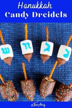 chocolate dipped marshmallows with sprinkles on them and the words hanukkah candy dreibles