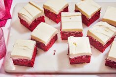 red velvet desserts with white frosting on a plate