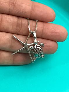 "Sterling Silver Filigree Turtle and Starfish Charm Necklace Great gift for beach lover. Metal: All components are made from solid .925 Sterling Silver Measurement: Turtle height is 25mm (0.98\") and 14mm (0.55\") wide ; Starfish height is 31mm (1.2\") and 21mm (0.83\") wide Choose Chain Length You can find other charm jewelry in my shop here https://www.etsy.com/shop/LinksAndStones?ref=seller-platform-mcnav&section_id=24389019 Please feel free to Convo me with any questions before purchasin Silver Starfish Jewelry For Beach, Silver Starfish Jewelry For Vacation, Silver Jewelry With Starfish Charm For The Beach, Beach Jewelry With Star Charm Pendant, Beach Jewelry With Sterling Silver Star, Beach Jewelry In Sterling Silver With Star Shape, April Birthstone Necklace, White Opal Earrings, Nautical Necklace