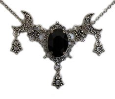 This is a new handmade necklace. It is made with antiqued silver plated filigrees, accented with a high quality JET BLACK glass rhinestone. Decorated portion is 2 1/2" wide and 1 3/4" tall in the center. Necklace is adjustable 15-18" with a lobster clasp and chain extender. If you would like a different length, please send us a message. Gothic Black Necklace For Fantasy Events, Black Gothic Necklace For Fantasy Events, Black Gothic Jewelry With Oxidized Finish, Adjustable Oxidized Gothic Necklace, Gothic Black Jewelry With Moon Phase, Gothic Crescent Silver Necklace, Adjustable Gothic Antique Silver Necklace, Gothic Black Moon Phase Jewelry, Vintage Necklace Victorian Gothic Jewelry