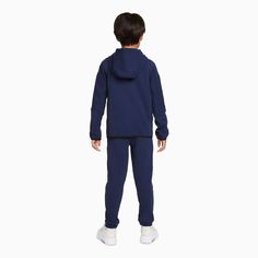 The Nike Sportswear Tech Fleece Set includes a cozy jacket and soft, matching pants for an easy everyday outfit. Benefits Nike Tech Fleece fabric offers the ultimate in lightweight warmth. The design is longer in the back for extra coverage. Cuffs stretch to help keep the fit in place. An elastic waistband stretches to give little ones a snug fit. Product Details Standard fit for a relaxed, easy feel 67% cotton/33% polyester Machine wash Color: Midnight Navy Style: 86H052-U90 Tech Fleece Outfit, Fleece Outfit, Nike Sportswear Tech Fleece, Kids Sportswear, Cozy Jacket, Navy Style, Nike Tech Fleece, Nike Tech, Tech Fleece