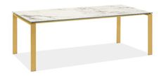 a marble top table with gold legs