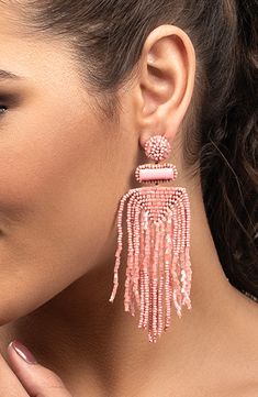 Designed to swish and sway right above the shoulders, these dramatic tassel earrings are handcrafted with shimmery beads and sparkly faux-stone accents. 3 3/4" drop; 1 1/4" width Post back Handmade Brass/glass/enamel/faux leather Imported Deepa Gurnani, Beaded Tassel Earrings, Rollerball Perfume, Handmade Brass, Makeup Gift, Brass Glass, Faux Stone, Fragrance Design, Fabric Gift Bags