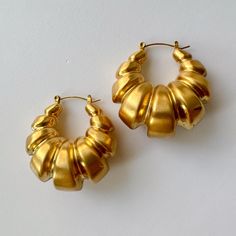 ~ Surgical graded stainless steel vacuum plated with 18K gold, ~ tarnish free, ~ hollow, have some weight due to the size. ~ Two finishes. ~ Sold as pair.  ~ The most adorable croissant hoop earrings. Bold and unique.  ~ Vintage inspired.  ~ we ship in 1-3 days. ~ all purchase come with complimentary jewelry box and pouch. Hypoallergenic Small Hoop Gold Plug Earrings, Nickel-free Gold Hoop Plug Earrings, Gold Hypoallergenic Hoop Plug Earrings, Nickel-free Gold Stainless Steel Hoop Earrings, Small Hoop Gold Plug Earrings, Nickel-free Gold Metal Huggie Earrings, Gold Hoop Plug Earrings, Modern Gold Hoop Plug Earrings, Gold Chunky Earrings