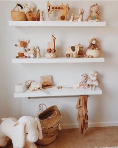 there are many toys on the shelves above the desk in this child's room