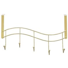 a gold metal shelf with four hooks and two clips on each end, hanging from the wall