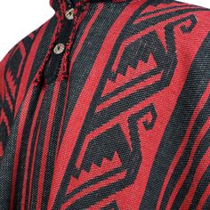 This striking unisex poncho is part of our premium collection, crafted from substantial llama wool yarn for a heavier feel, ideal for cooler temperatures. It boasts a bold black and red color palette, with a geometric Aztec-inspired pattern that adds an element of timeless style. The fabric has been meticulously brushed for added softness, ensuring it provides both warmth and comfort. Its generous cut allows for ease of movement, making it a versatile piece for any wardrobe. The fringed edges gi Red Color Palette, Red Colour Palette, Wool Poncho, Hooded Poncho, Colour Pattern, South American, Bold Black, Wool Yarn, Timeless Style