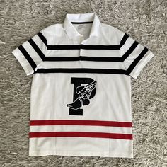 Polo Ralph Lauren P-Wing Wing Foot Stripe Polo Shirt 1992 Mens Size Medium Pulled The Tags, Tried It On But Never Wore It Out. Shirt Has Never Been Washed Just Hung In My Closet Over The Years. Ralph Lauren White T-shirt With Graphic Print, White Collared Shirt For College, Ralph Lauren Cotton Sporty Polo Shirt, Ralph Lauren Sporty Cotton Polo Shirt, White Polo Shirt For College, Ralph Lauren Sporty T-shirt With Graphic Print, Sporty Ralph Lauren T-shirt With Graphic Print, White Ralph Lauren T-shirt With Graphic Print, White Ralph Lauren Polo Collar Shirt