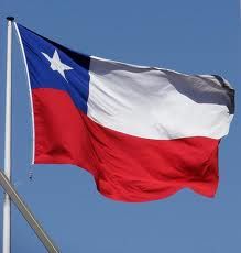 the texas state flag is flying high in the blue sky with a white star on it