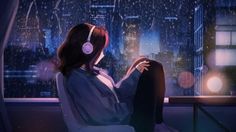 a woman with headphones sitting in front of a window looking out at the city