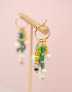 Dangle Hoop Earrings With Charms, Trendy Hoop Earrings With Dangling Beads, Trendy Small Hoop Earrings With Dangling Beads, Trendy Small Hoop Earrings With Dangling Charms, Hoop Earrings With Charms For Jewelry Making, Colorful Beaded Dangle Earrings For Everyday, Colorful Handmade Dangle Hoop Earrings, Multicolor Hoop Earrings With Dangling Beads, Artisan Multicolor Dangling Beads Earrings