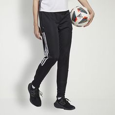 Too good to limit to the soccer pitch. These adidas Tiro pants debuted as training wear, but they're now a streetwear staple. Ankle zips allow you to quickly pull them on over trainers and cleats. Ribbed details bring in the cut at the lower legs. Moisture-absorbing AEROREADY will keep you comfortable. As will the knowledge that they're made from recycled materials.Front Style: Flat FrontFeatures: DrawstringClosure Type: Drawstring, Full ElasticFit: Classic FitPockets: 2 Side Slip PocketsRise: M Adidas Moisture-wicking Training Pants, Adidas Sportswear Pants For Training, Adidas Functional Jogging Bottoms, Adidas Pants With Elastic Side Panels For Sports, Functional Adidas Jogging Bottoms, Functional Adidas Bottoms For Jogging, Adidas Training Bottoms With Three Stripes, Adidas Training Bottoms With Three Stripes Branding, Adidas Sports Pants With Side Stripes