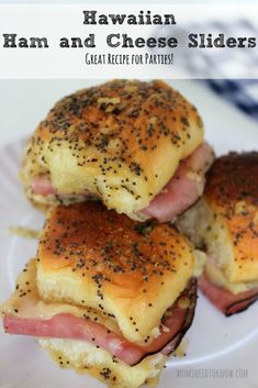 hawaiian ham and cheese sliders on a plate with text overlay that reads hawaiian ham and cheese sliders