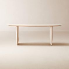 an oval white table with two legs on the top and one leg extended to the side