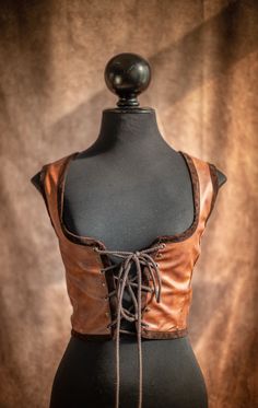 Steampunk Bodice Fake Leather Renaissance Corset Vest Dark - Etsy Gothic Festival Vest For Fall, Gothic Vest For Fall Festival, Fitted Steampunk Vest For Costume Party, Gothic Brown Corset For Festival, Gothic Underbust Corset For Fall, Gothic Brown Corset For Costume, Gothic Brown Corset Dress For Cosplay, Brown Gothic Corset For Costume, Brown Gothic Corset Dress For Cosplay