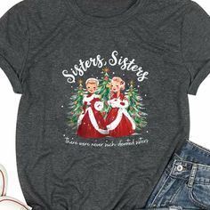 White Christmas 1954 Classic Holiday Movie Sisters, Sisters There Were Never Such Devoted Sisters Tee New Size Large Your Favorite Classic Holiday “Characters” Featured Betty Haynes (Rosemary Clooney), & Judy Haynes (Vera-Ellen) In A Fun Cartoon Print. An Iconic Sister Pair White Christmas 1954, Womens Christmas Shirts, Christmas Graphic, Holiday Movie, Plus Size Kleidung, Classic Holiday, Crew Neck Tee, White Christmas, Plus Size T Shirts