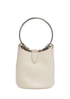 "Find ALAÏA Medium Ring Bucket Bag In Leather on Editorialist. ALAIA bucket bag in leather Metal ring top handle Open top with magnetic closure Interior, leashed zip pouch bag Lining: Leather Approx. 7\"H x 8\"W x 0.5\"D Professional cleaning recommended Made in Italy" Chic Bucket Bag With Silver-tone Hardware For Shopping, Chic Shopping Bucket Bag With Silver-tone Hardware, Chic Bucket Bag With Silver-tone Hardware, Modern Formal Bucket Bag With Silver-tone Hardware, Elegant Bucket Bag With Metal Hardware, Chic Shopping Bucket Bag With Metal Hardware, Modern Shopping Bucket Bag With Silver-tone Hardware, Designer Bucket Bag With Silver-tone Hardware, Designer Top Handle Bucket Bag With Silver-tone Hardware