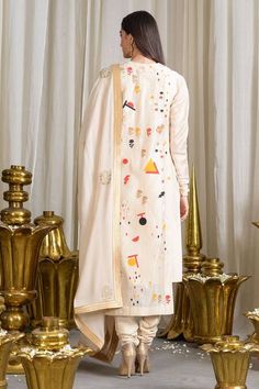 Buy Beige Cotton Silk Kurta Set With Geometric Motifs And Appliques Details For Women by Sahil Kochhar Online at Aza Fashions. Designer Chanderi Unstitched Suit In Cream, Designer Sherwani With Printed Motifs For Festive Occasions, Designer Cream Chanderi Unstitched Suit, Designer Cotton Sherwani With Straight Kurta, Designer Kurta With Dupatta For Eid, Cream Cotton Anarkali Set With Straight Kurta, Off White Salwar Kameez With Printed Motifs For Eid, Cream Cotton Anarkali Set For Festivals, Designer Sets With Mirror Work For Festivals