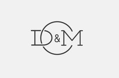 the logo for d & m is shown in black and white, on a light gray background