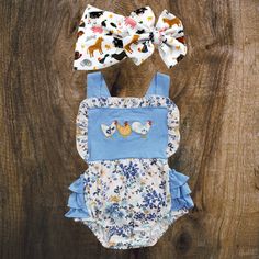 We suggest pairing this romper with our Farm Friends bow! *Please note the suggested bow is not apart of the set but is available for purchase separately.* Cute Spring Bubble Romper With Matching Headband, Cute Cotton Onesie For Easter, Cute Cotton Sets For Easter, Cute Summer Sets With Matching Headband, Cute Summer Sets With Bow Detail, Cute Summer Sets With Bow, Cute Cotton Sets With Bow, Cute Cotton Sets With Bow Detail, Cute Cotton Set With Matching Headband