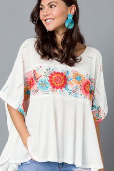 Bohemian Oversized Embroidered Tops, Bohemian Embroidered Oversized Tops, Oversized Embroidered Bohemian Tops, Oversized White Embroidered Top, Oversized Embroidered White Top, Off White Embroidered Summer Tops, Embroidered Off White Summer Tops, Short Sleeve Poncho For Spring Vacation, Short Sleeve Spring Poncho For Vacation