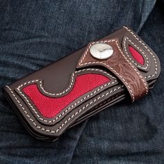 Japanese Tribal Red Stingray Leather Cowboy Biker Wallet  Genuine red stingray skin leather & dark brown cowhide.   Internal layout: 5 Credit Card Slots, 3 Bills Compartments and 1 Zip Compartment  Wallet size (closed): 4" x 7.5"  Wallet size (fully opened): 7" x 7.5" Brown Textured Leather Wallet, Red Leather Wallet With Card Slots, Red Leather Trifold Rectangular Wallet, Custom Hand Tooled Leather Trifold Wallet, Wallet Chains, Biker Wallet, Brown Cowhide, Belt Accessories, Stingray